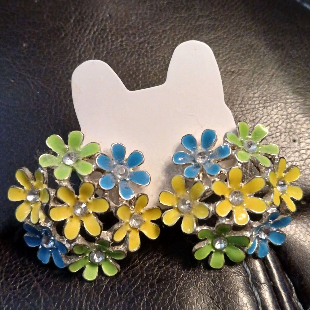 These are New Old Stock Vintage Enamel Flower Stud Earrings Blue Yellow & Green